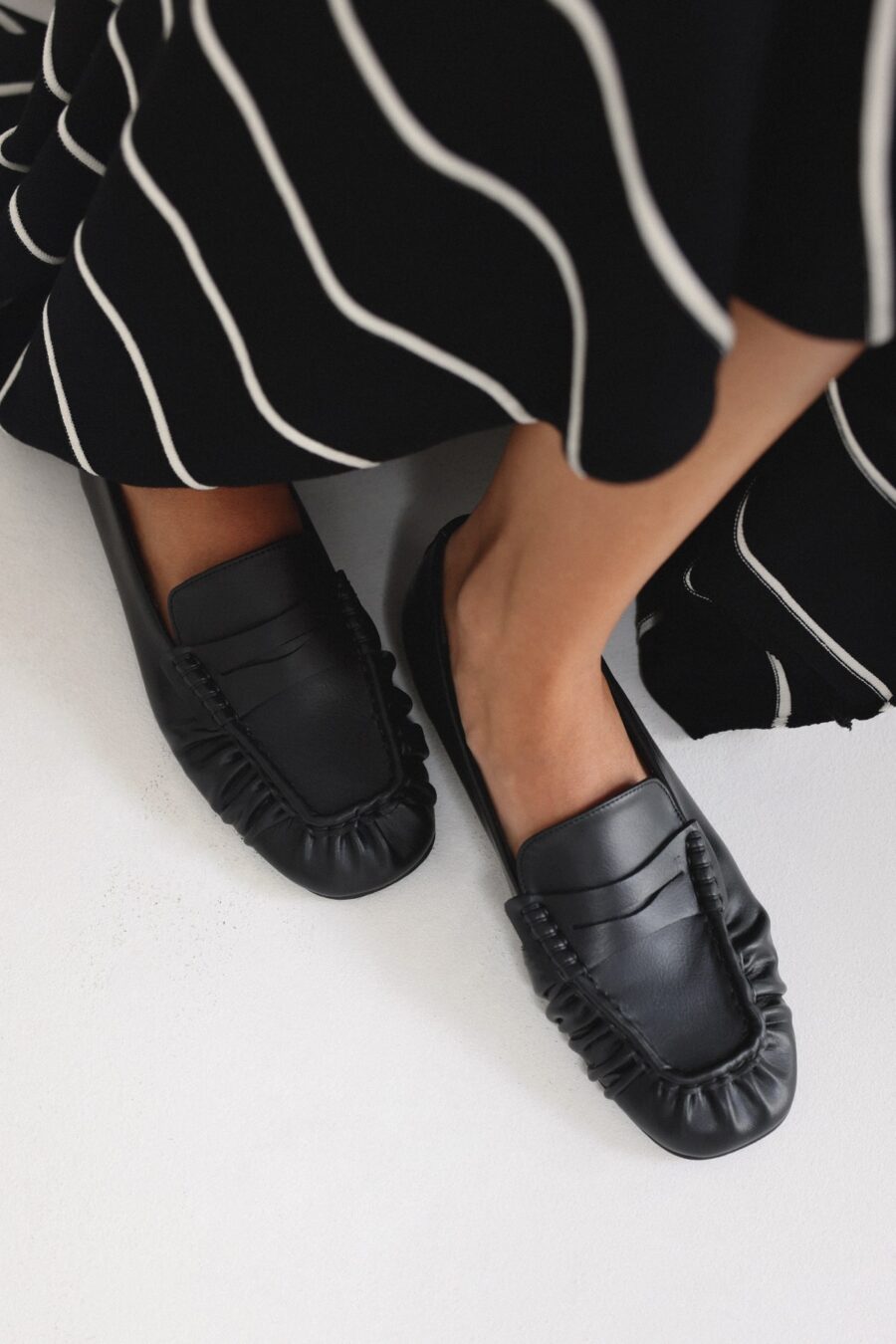 Black ruched loafers