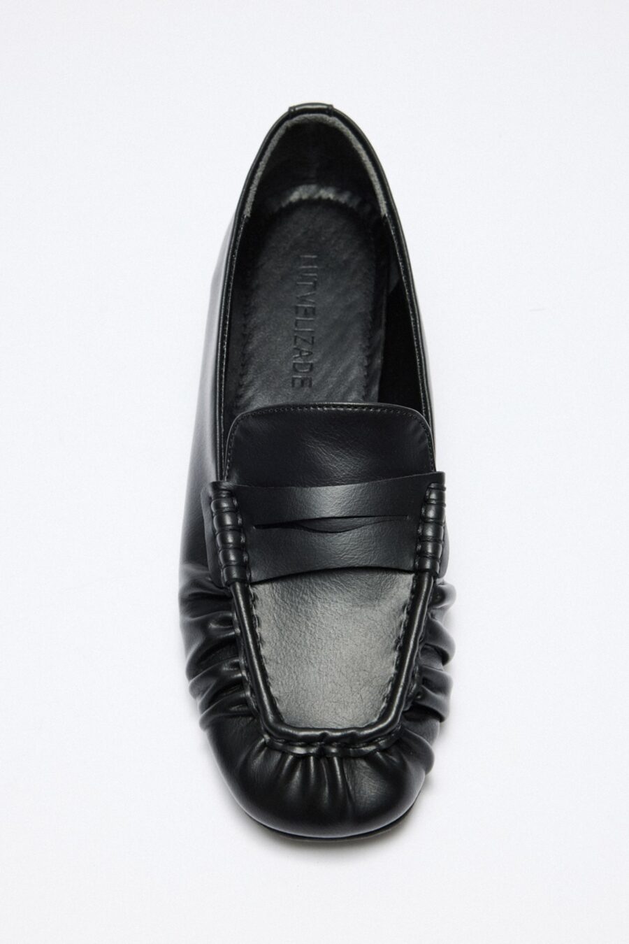 Black ruched loafers