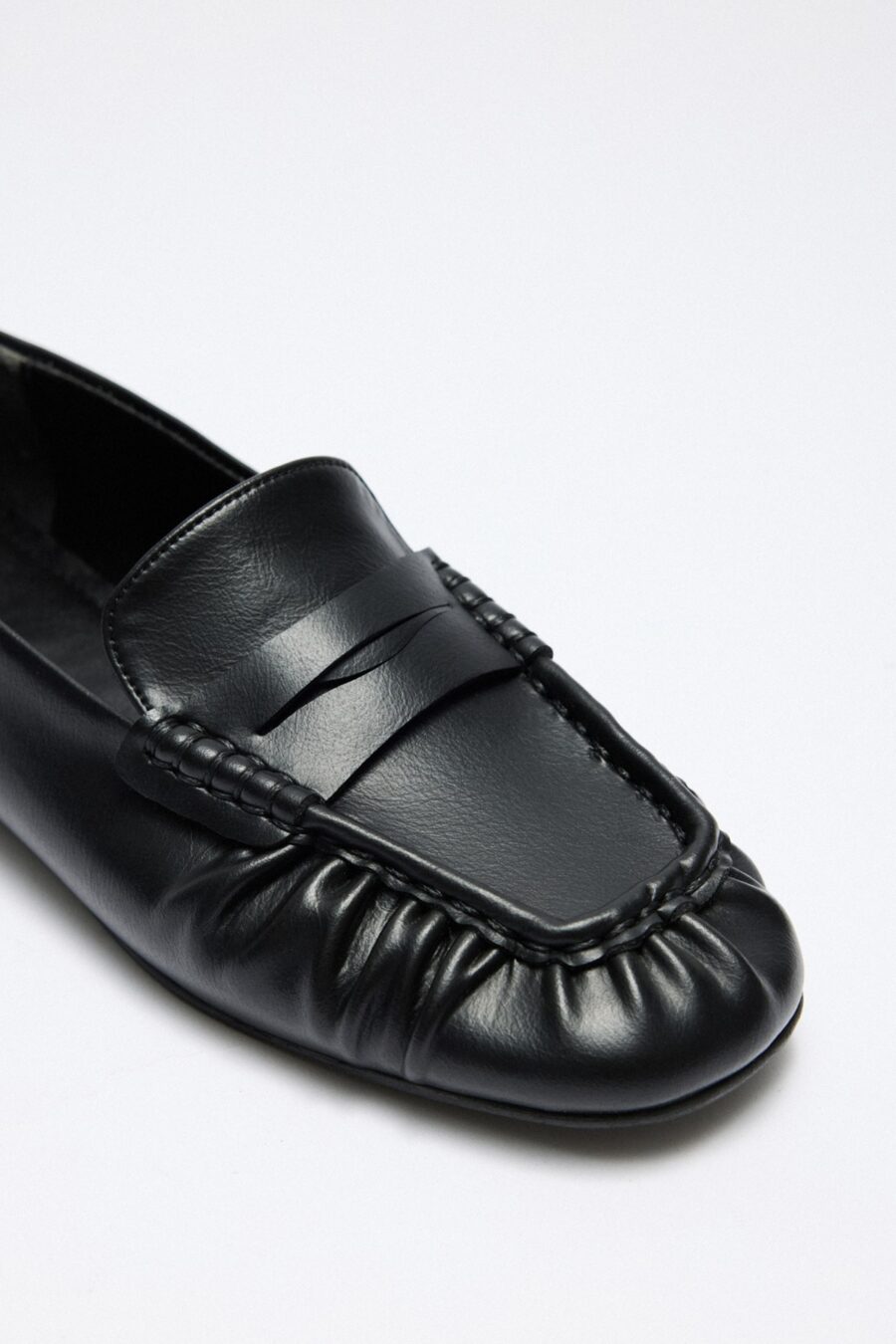Black ruched loafers