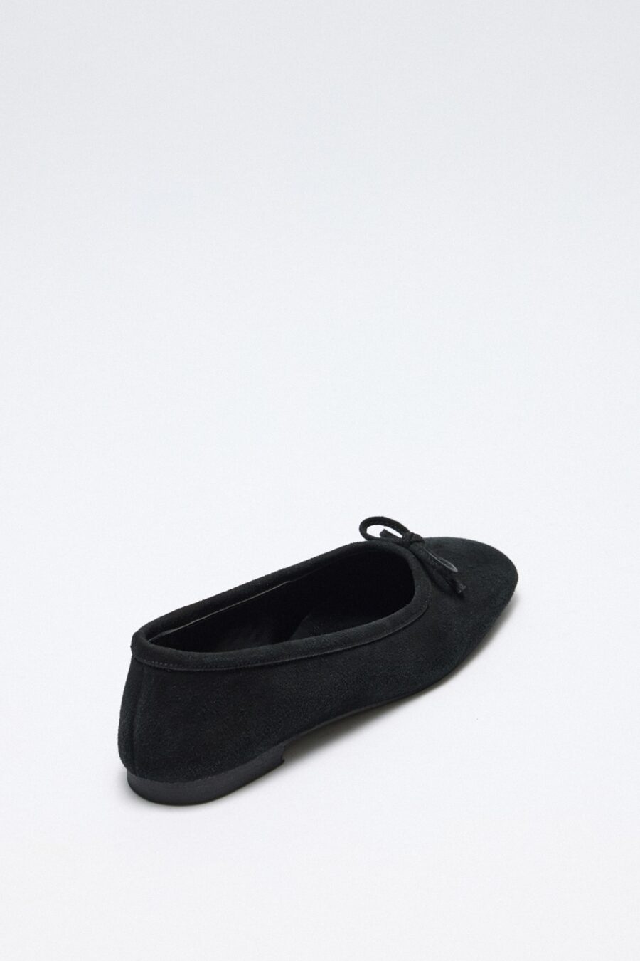 Black suede bow flats