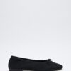 Black suede bow flats