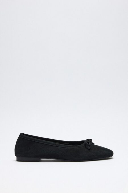 Black suede bow flats