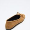 Tan suede bow flats