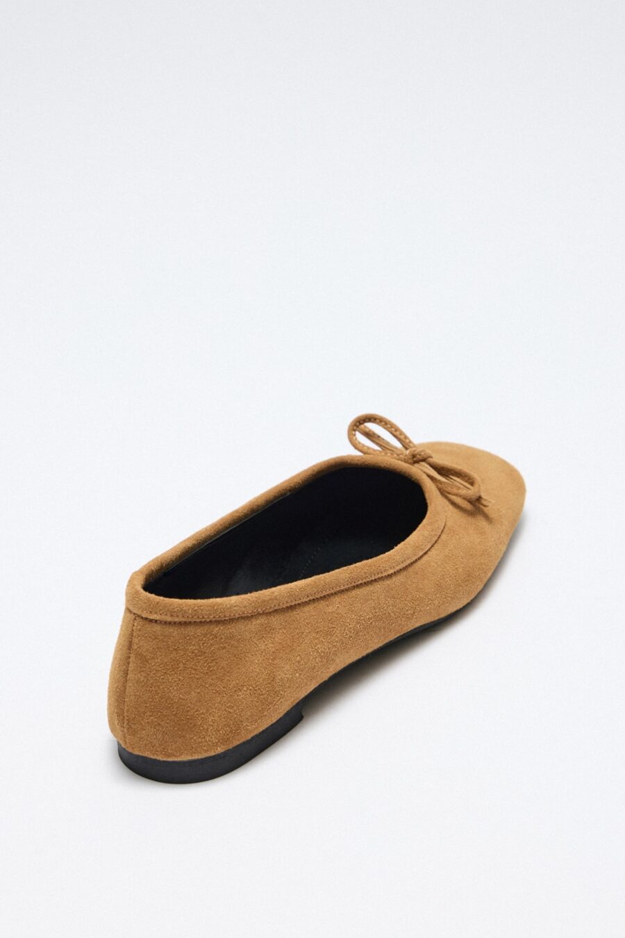 Tan suede bow flats