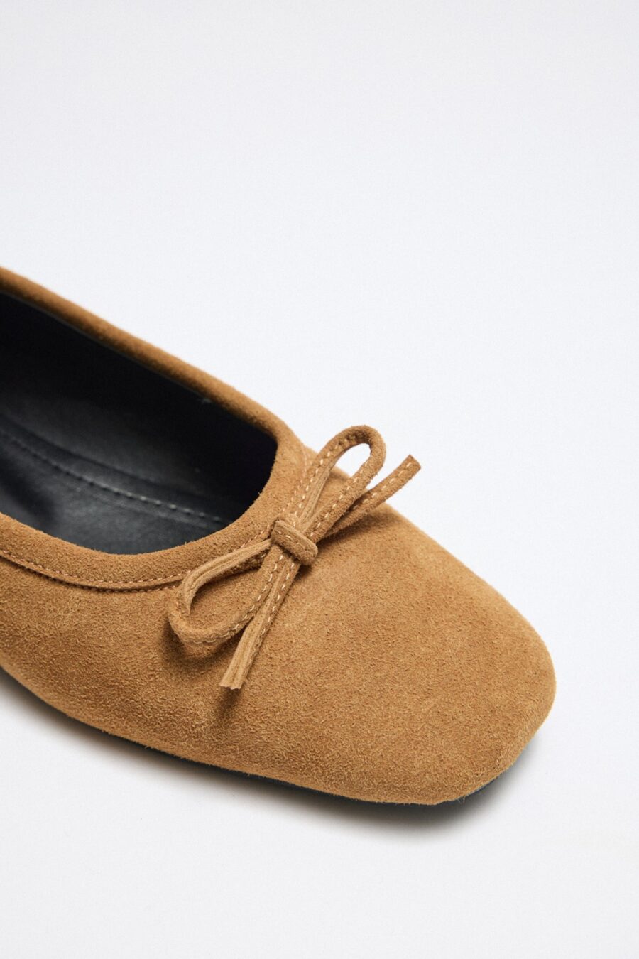 Tan suede bow flats