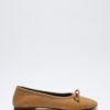 Tan suede bow flats