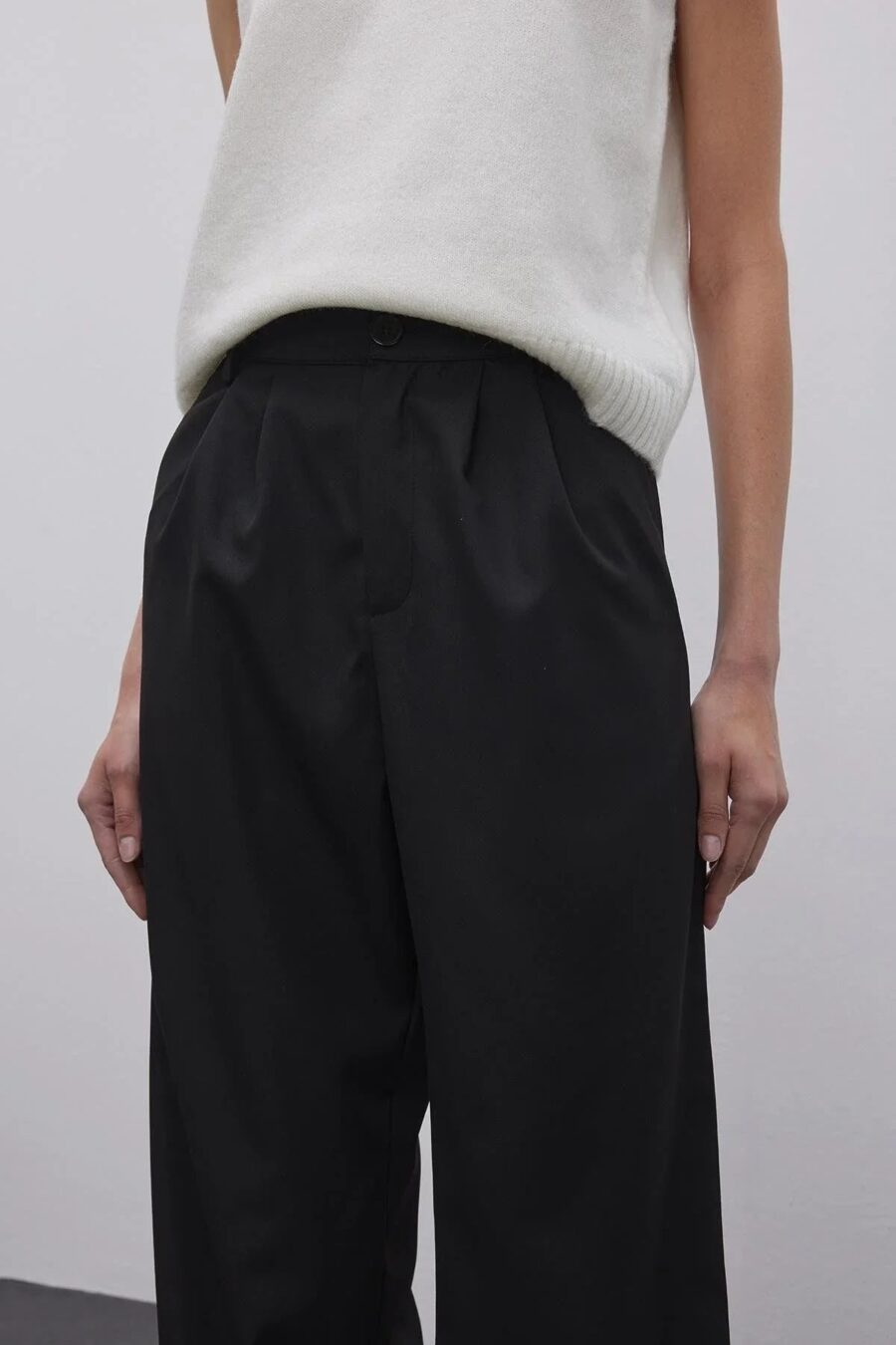 Black pleated palazzo trousers