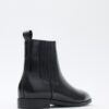 Black elastic ankle boots