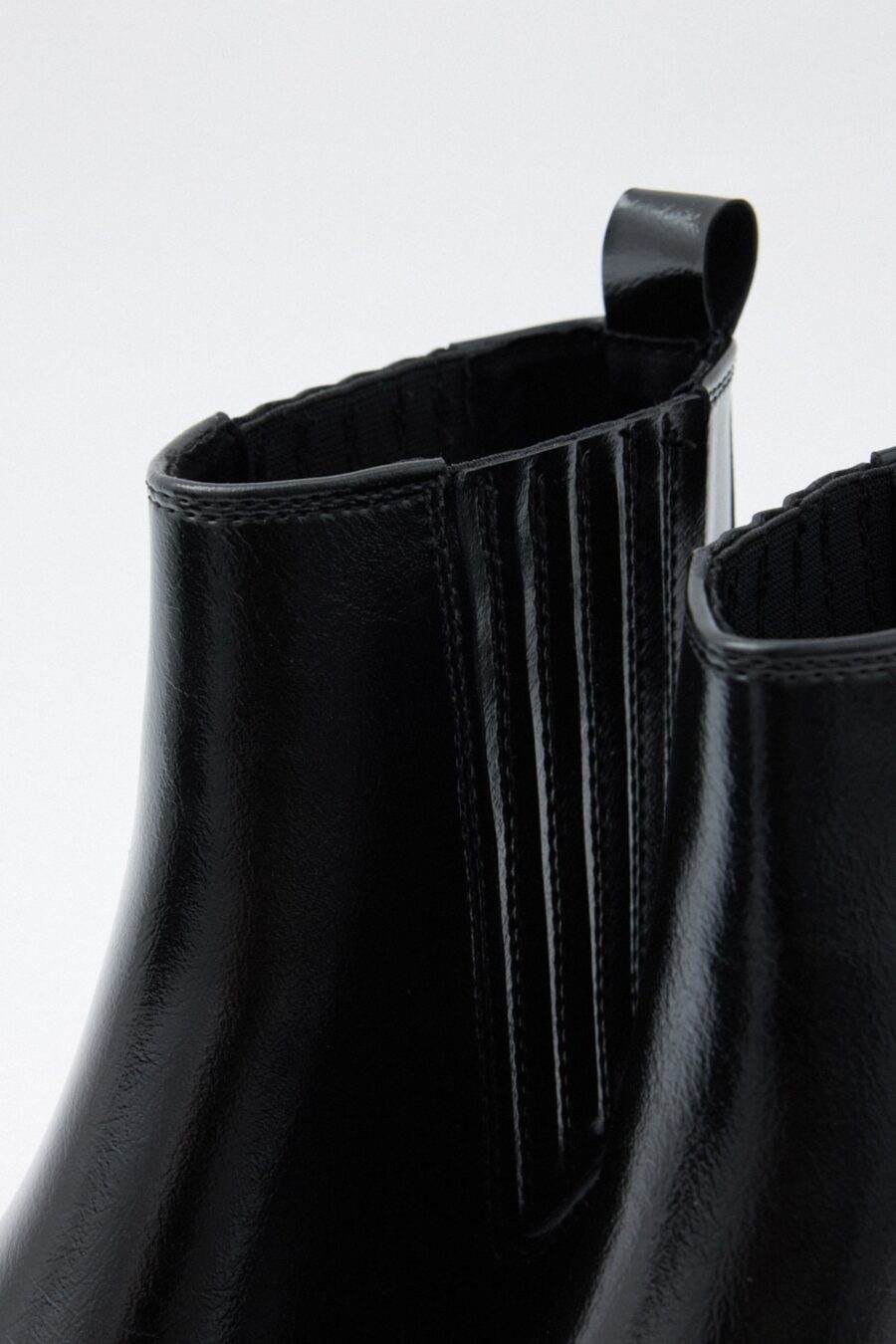 Black elastic ankle boots