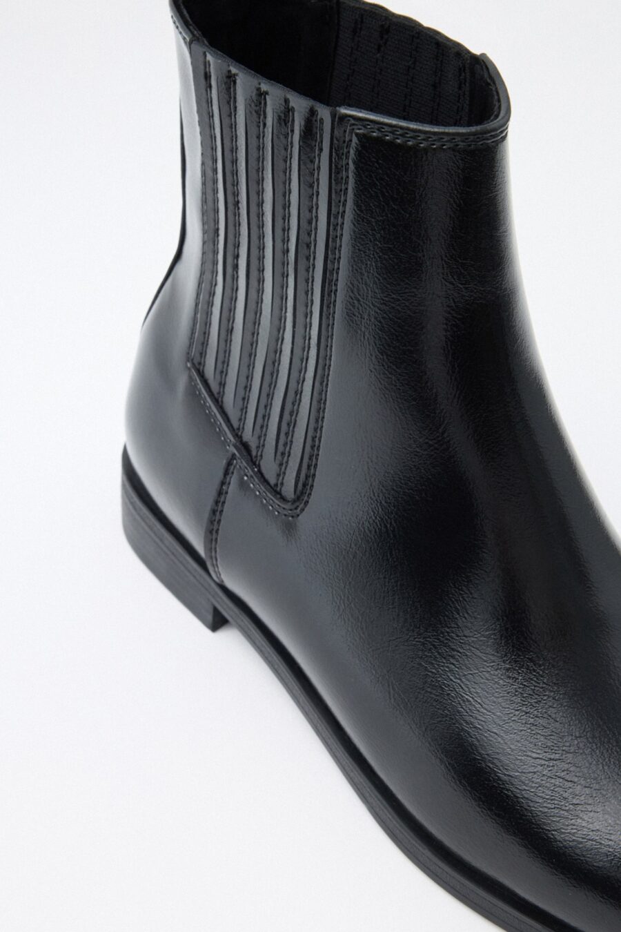 Black elastic ankle boots