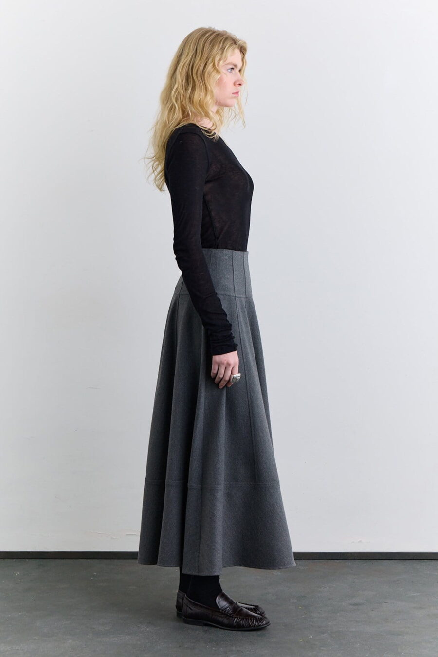 Grey high-neck blazer with skirt suit