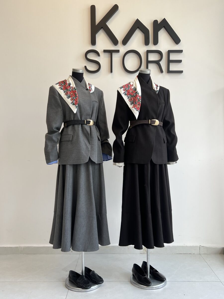 Grey high-neck blazer with skirt suit