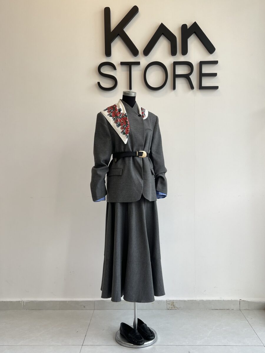 Grey high-neck blazer with skirt suit