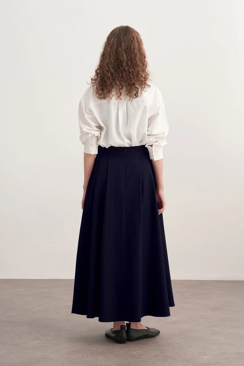 Navy blue gabardine double-pleated skirt