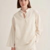 Ecru organic cotton v-neck blouse