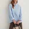 Light blue oversized button-detail shirt
