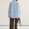 Light blue oversized button-detail shirt