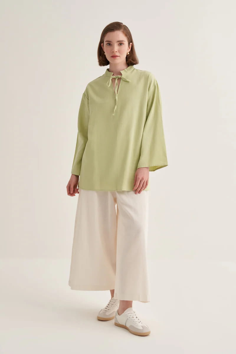 Light green organic cotton v-neck blouse