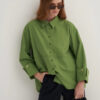 Light green oversized button-detail shirt