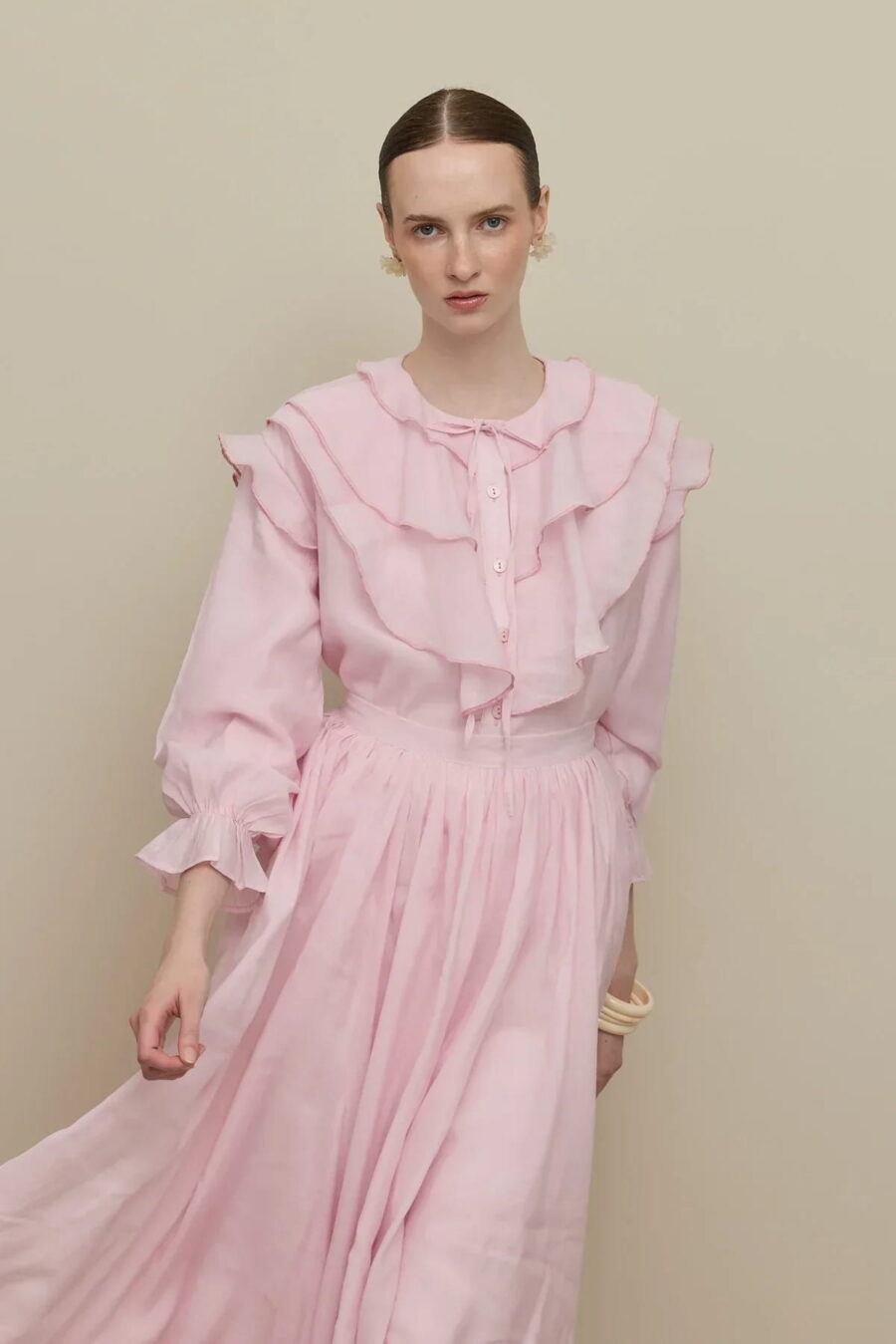 Light pink flounced detail suit