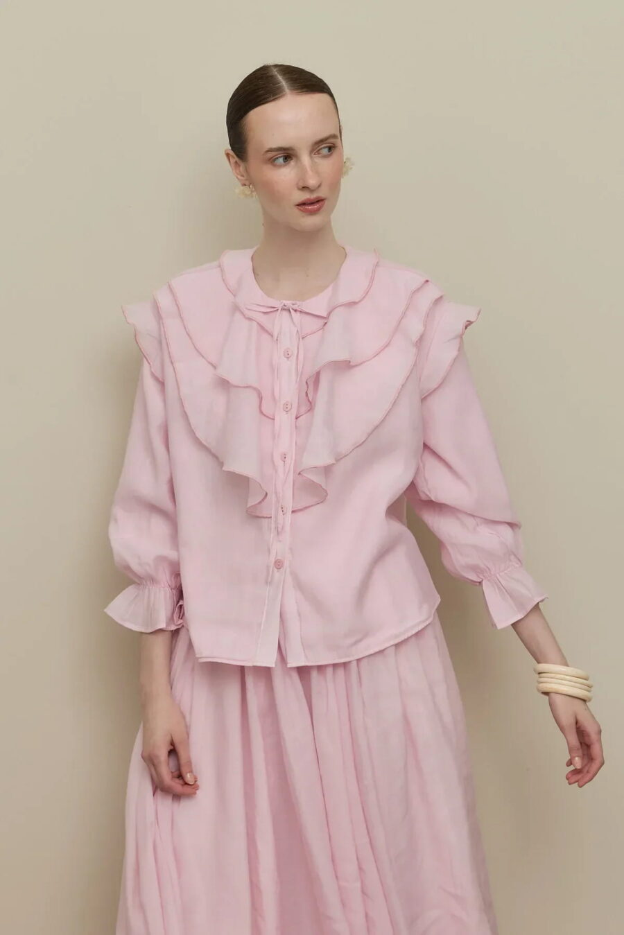 Light pink flounced detail suit