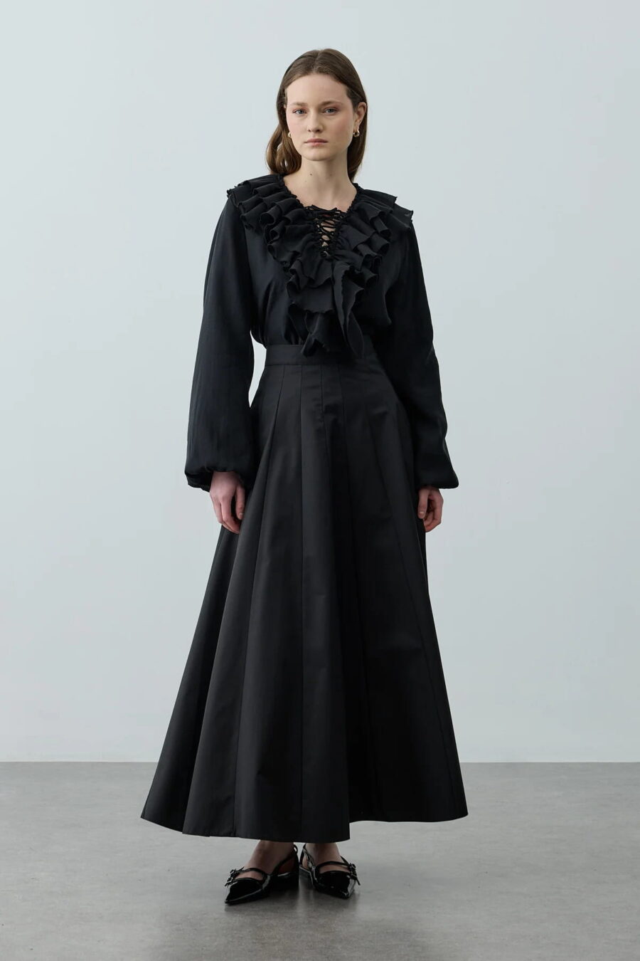 Black multi-piece godet skirt