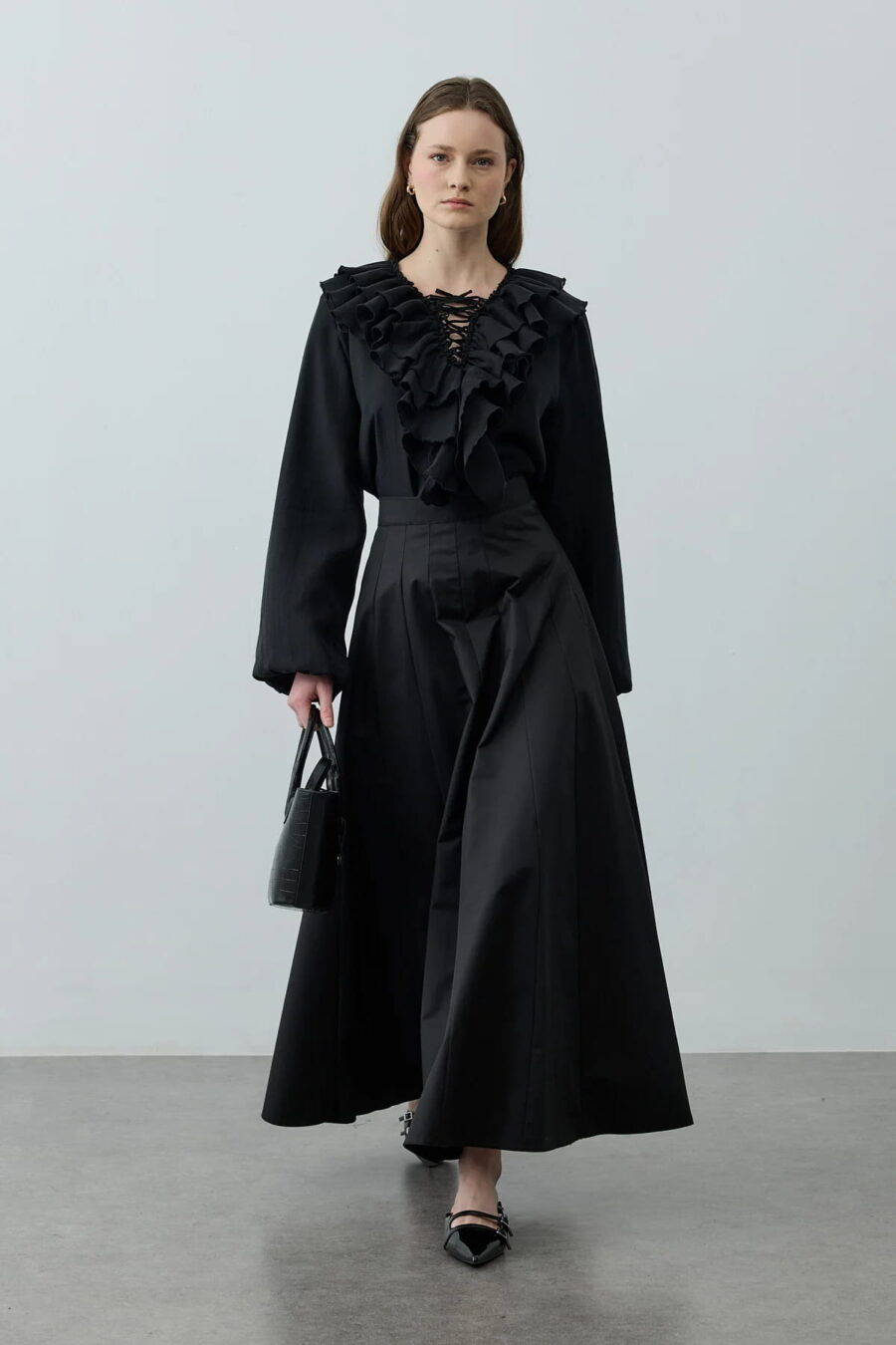 Black multi-piece godet skirt