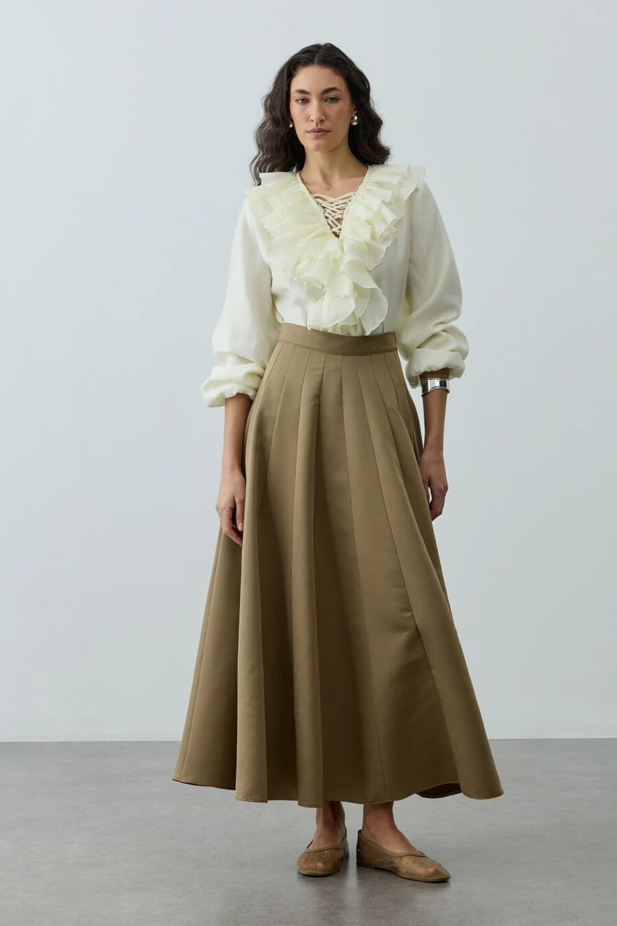 Green multi-piece godet skirt