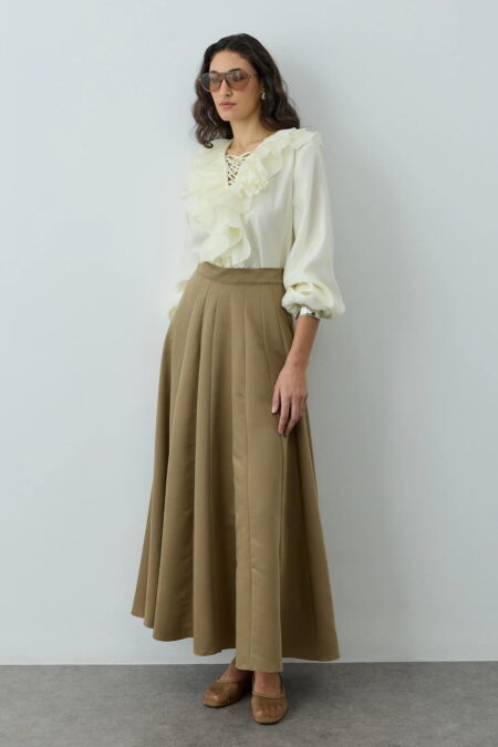 Green multi-piece godet skirt