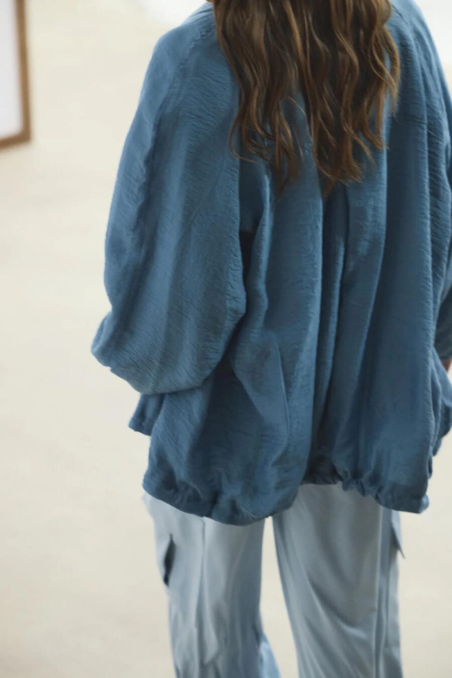 Blue high collar gathered bomber jacket