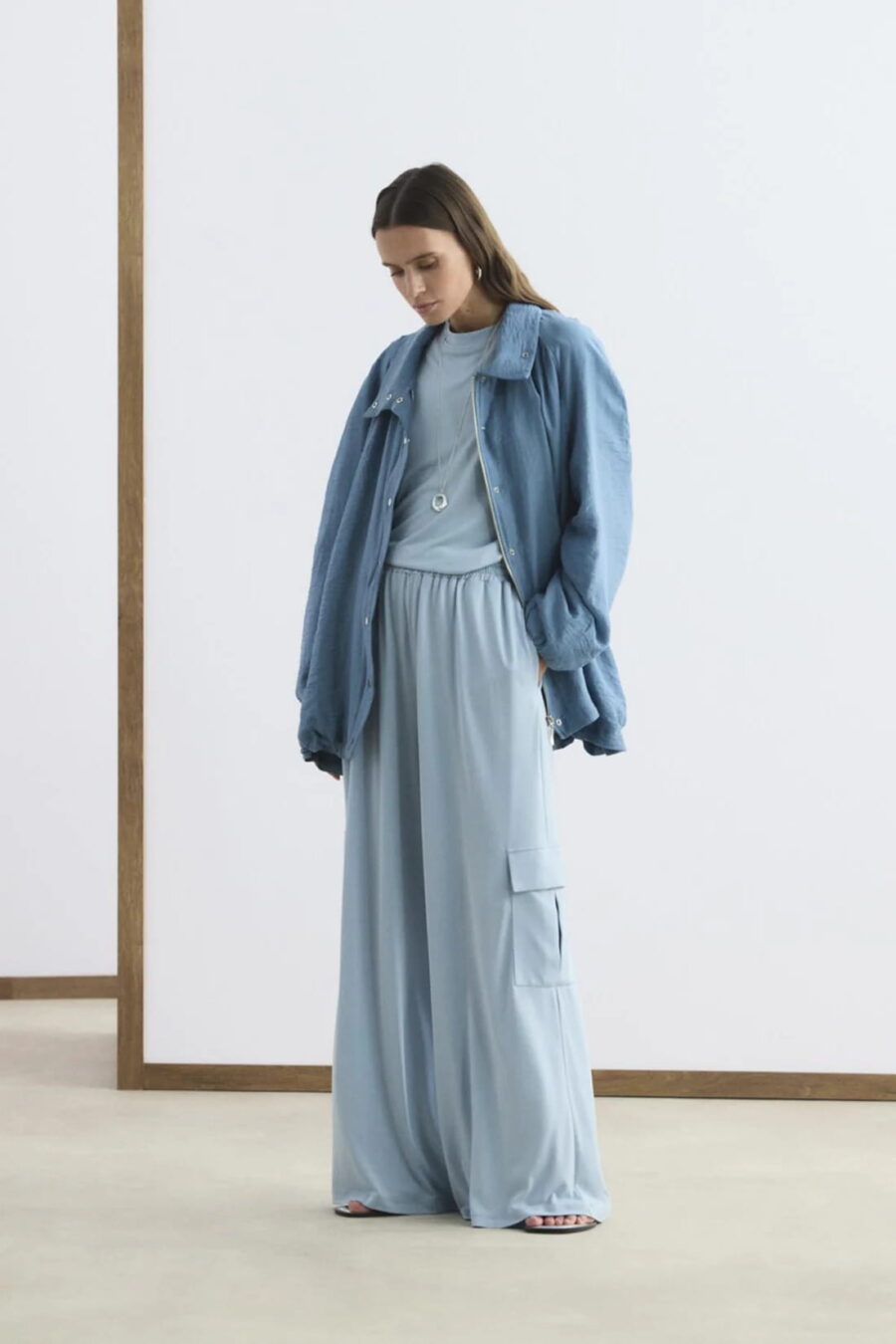 Blue high collar gathered bomber jacket